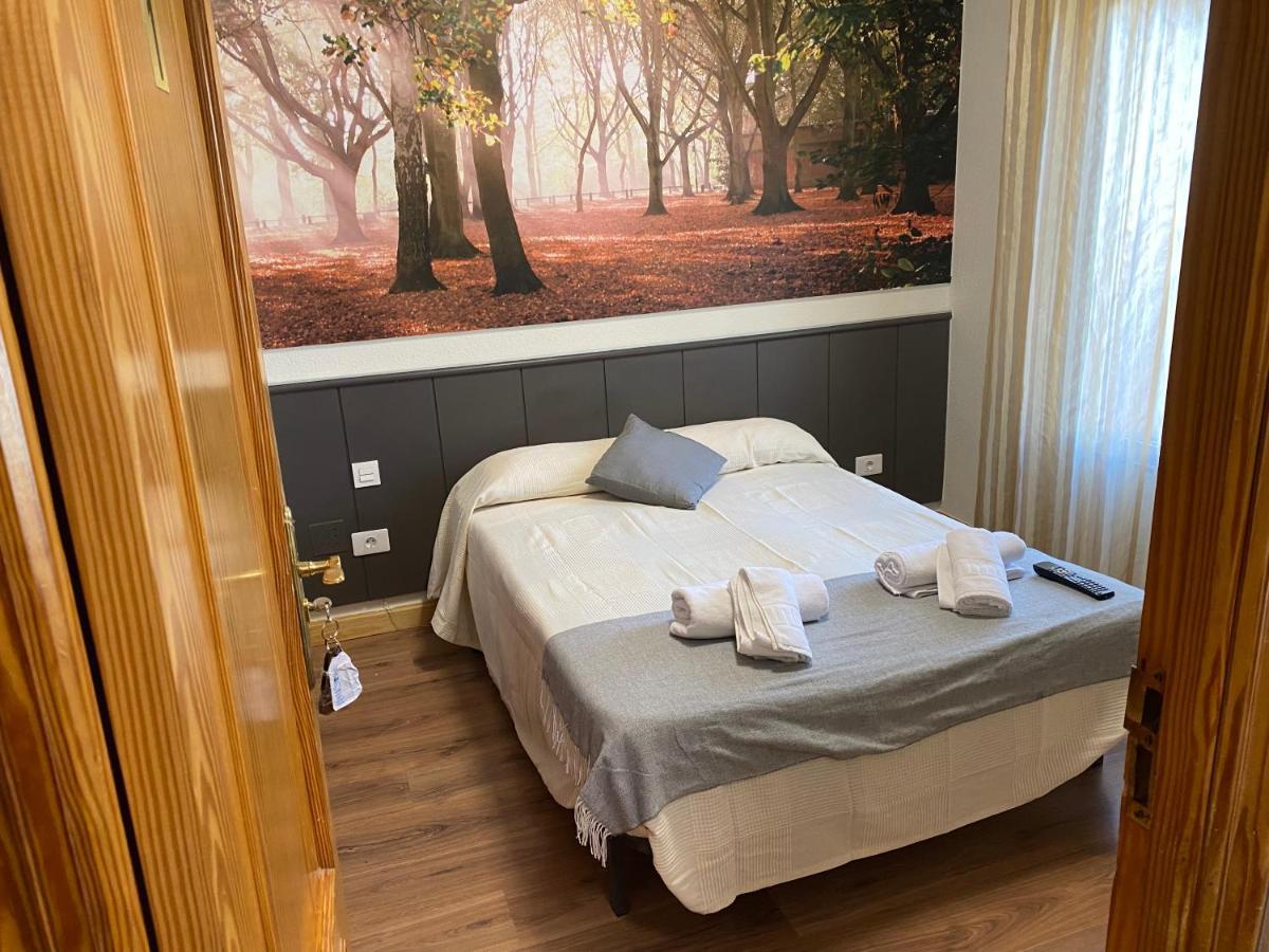 Hostal Restaurante Rio Ubierna Quintanilla-Vivar Buitenkant foto