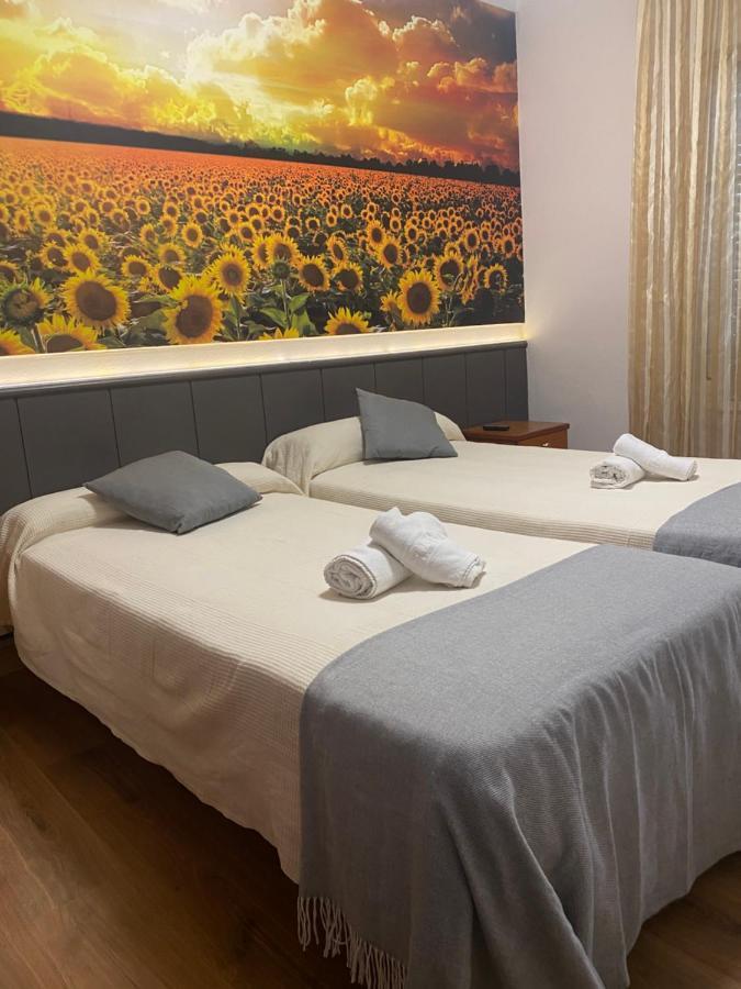Hostal Restaurante Rio Ubierna Quintanilla-Vivar Buitenkant foto